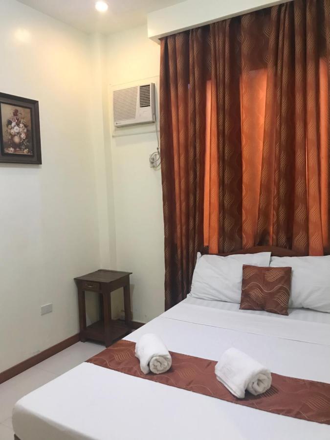 Aquari Travellers Inn Puerto Princesa Exterior photo