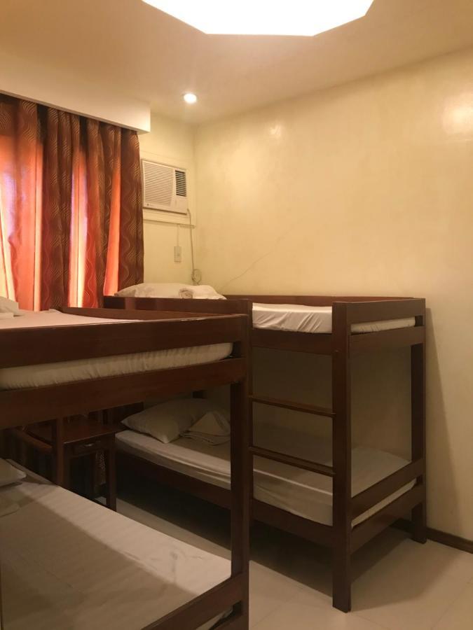 Aquari Travellers Inn Puerto Princesa Exterior photo
